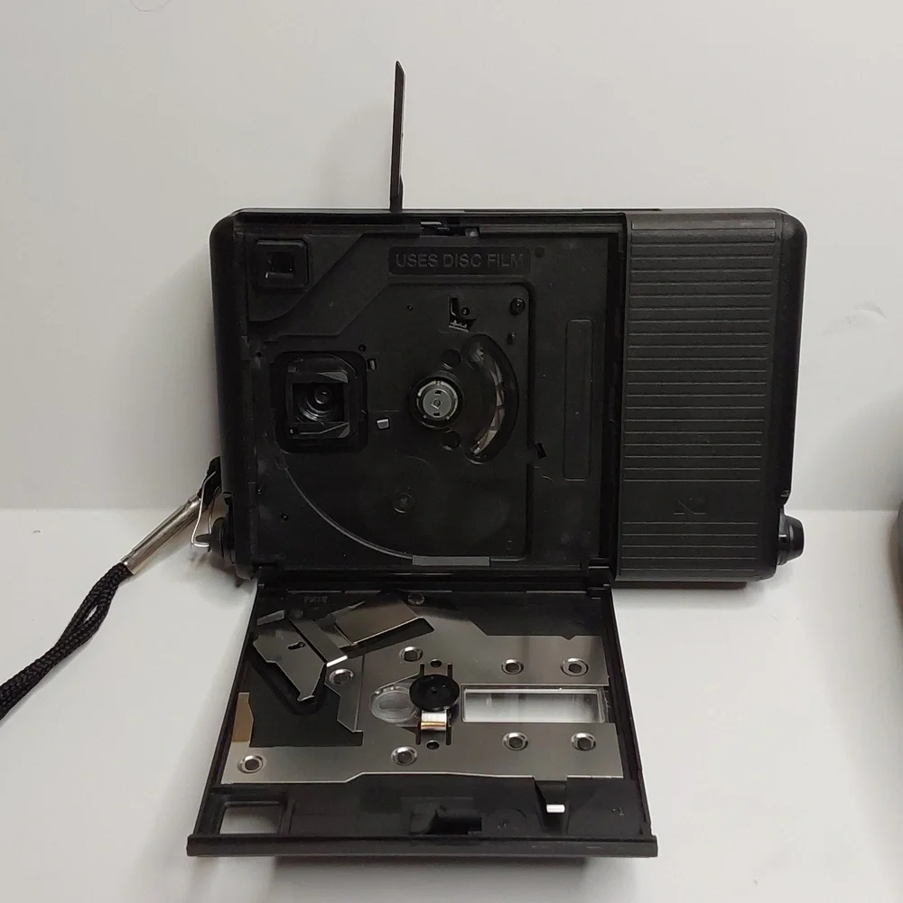 Kodak Disc 6100 PARTS camera with instruction booklet and generic case